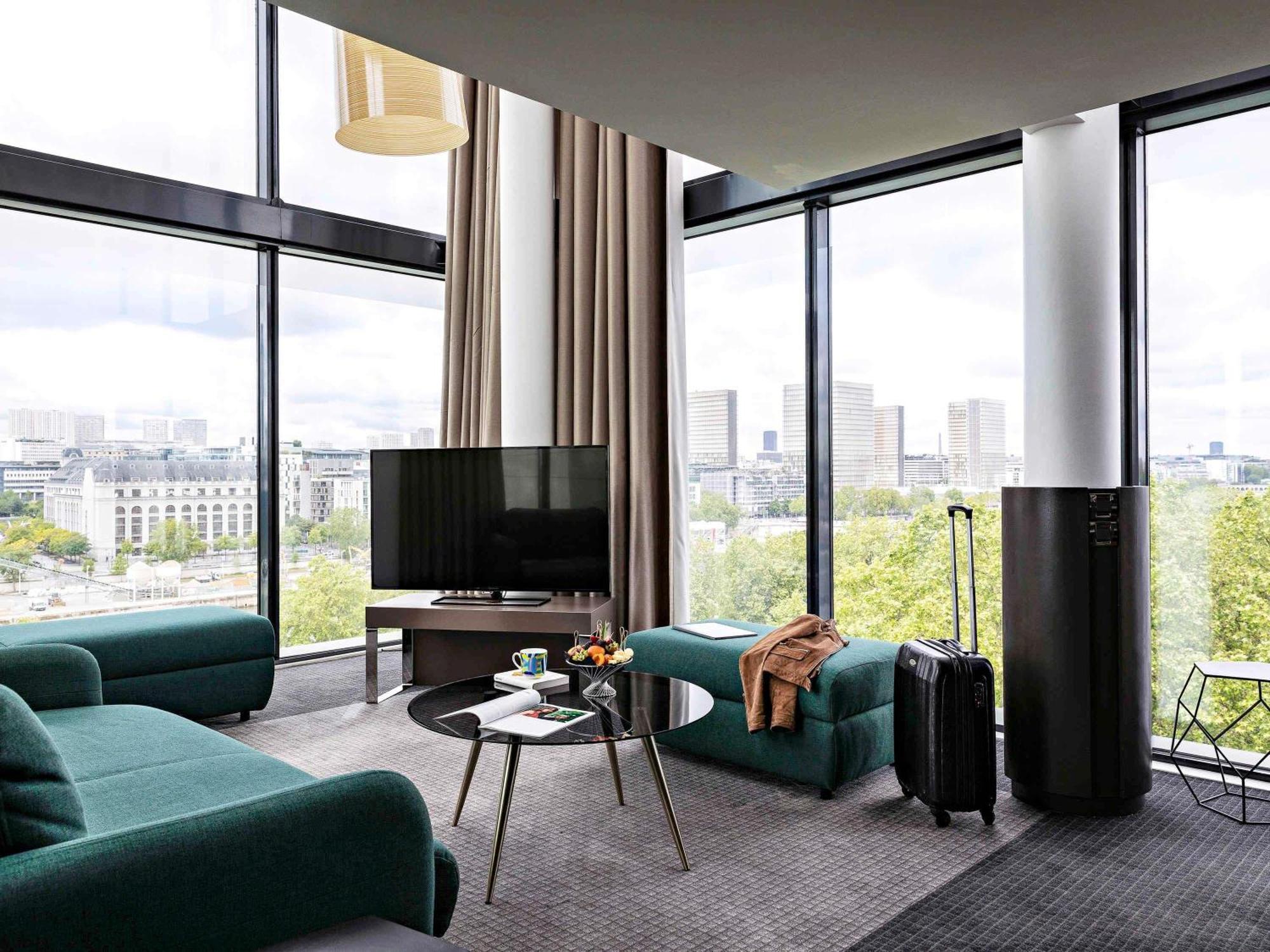 Präsidentensuite mit 2 Kingsize-Betten und 1 Doppelschlafsofa – obere Etage / Blick auf Paris